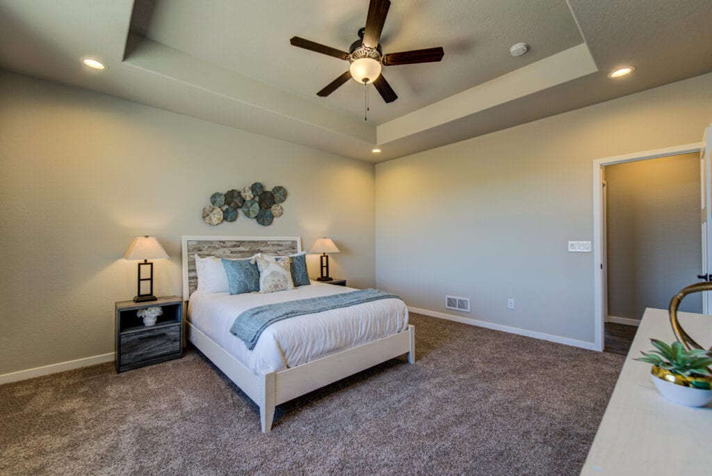 Pretty Bedroom With A Fan With Light